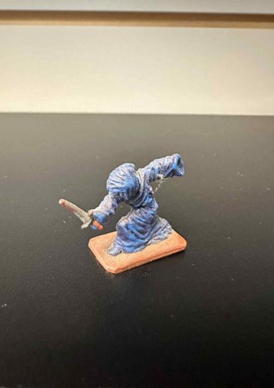 M63 Cloaked Person with Sword