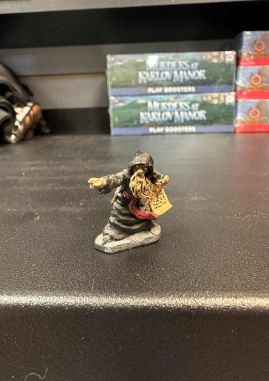 M76 Person Holding Scroll